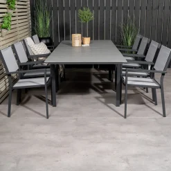 Matgrupp Venture Home Lova 160/240 med 8 Copacabana KarmstolarGrå Bord med Svarta Ben, Grå Stol med Svarta Ben